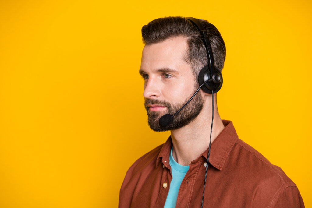 Side profile photo portrait of confident Gen Z call center assistant worker in headphones microphone