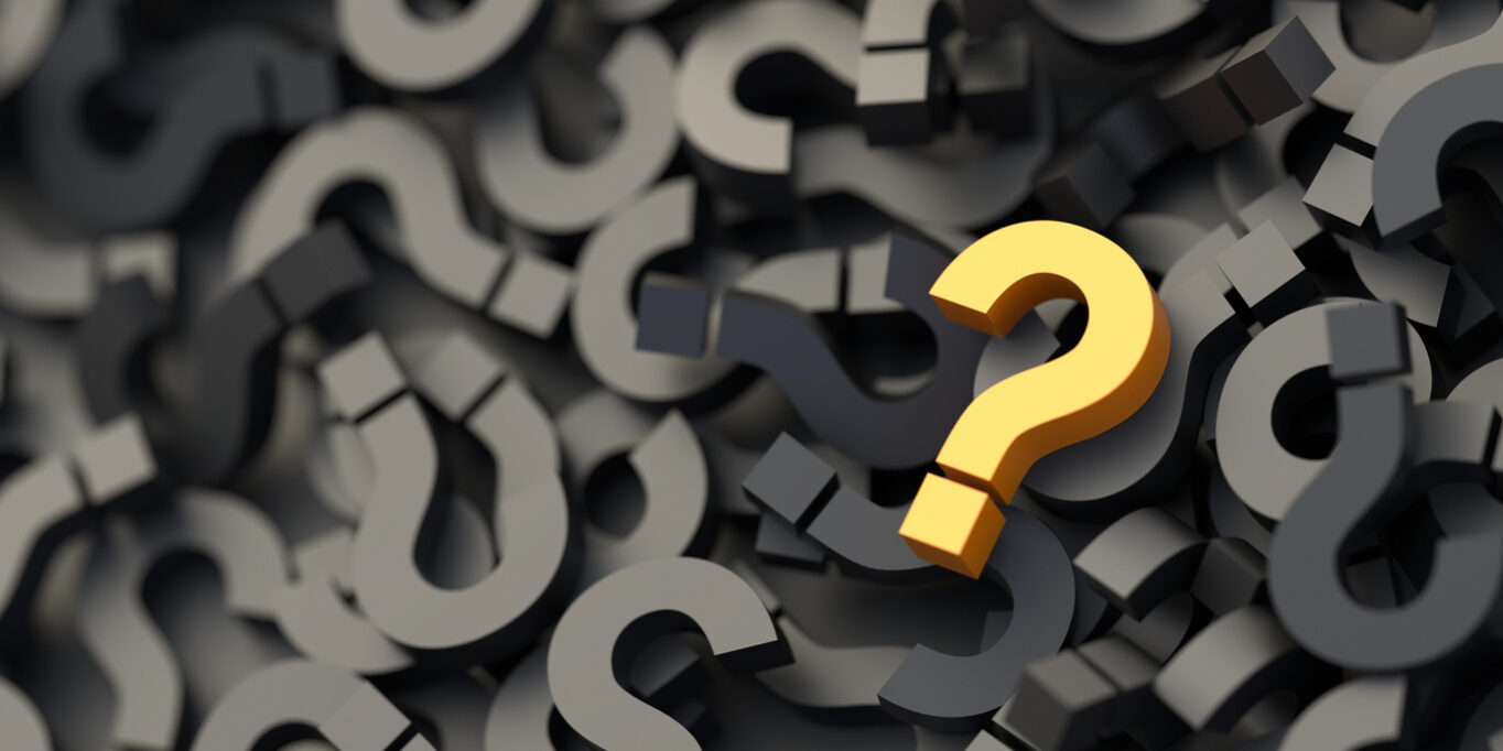 Yellow question mark on a background of black signs